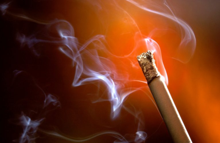 Smoking a cigarette