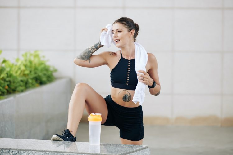 Sportswoman wiping off sweat