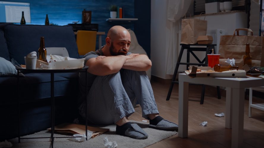 Stressed man going through episode of bipolar disorder