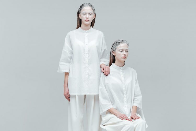 Two women in white clothes