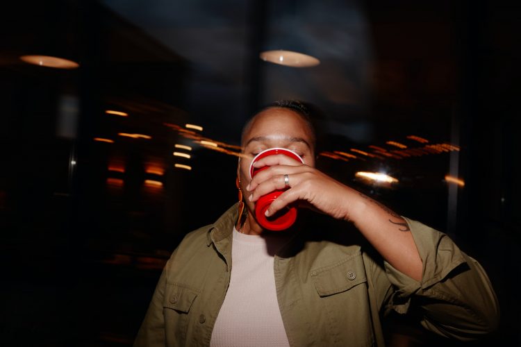 Young Woman Drinking Alcohol