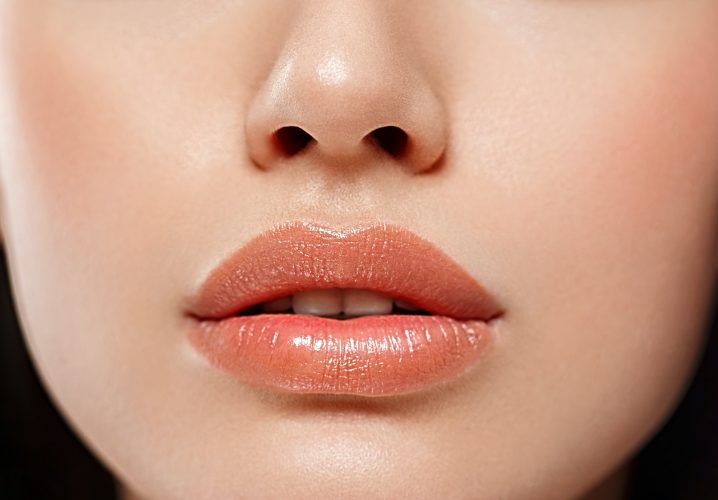 Woman lips mouth biting lip