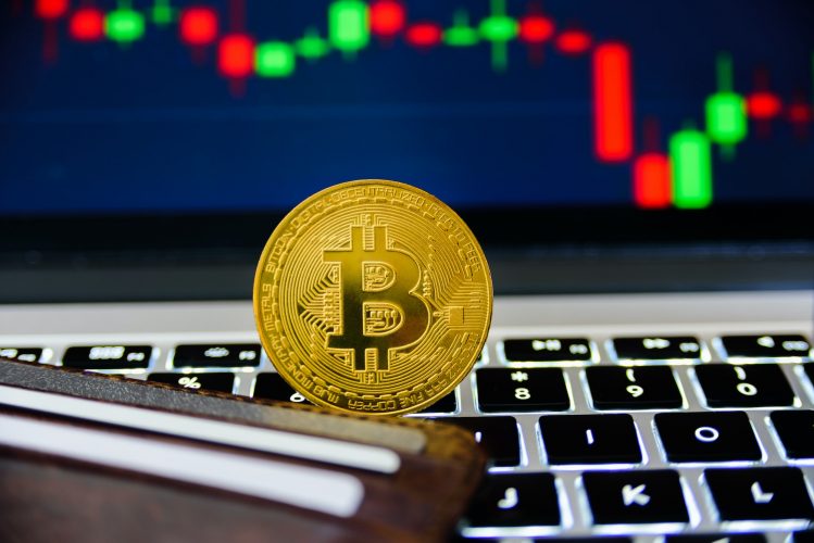 Bitcoin with chart on background