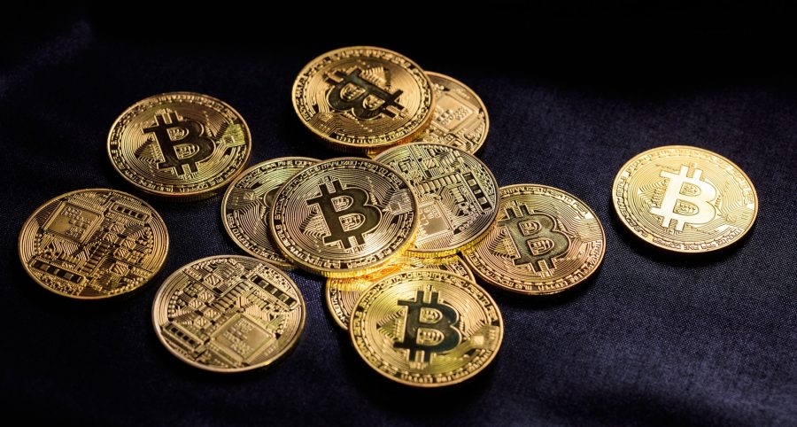 Bitcoins on black background