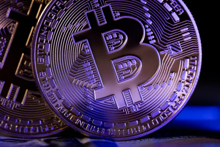 Golden coin with bitcoin symbol