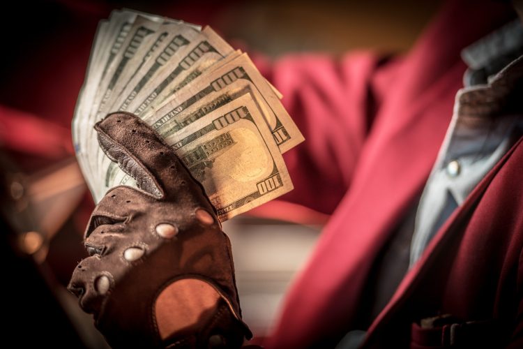 Cash Money in a Hand