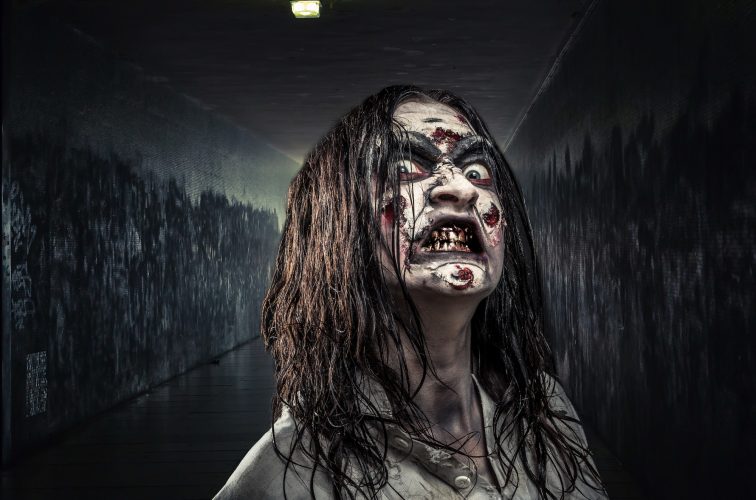 Zombie woman with bloody face
