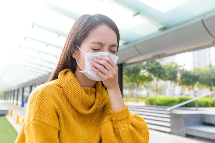 Asian woman wearing face mask