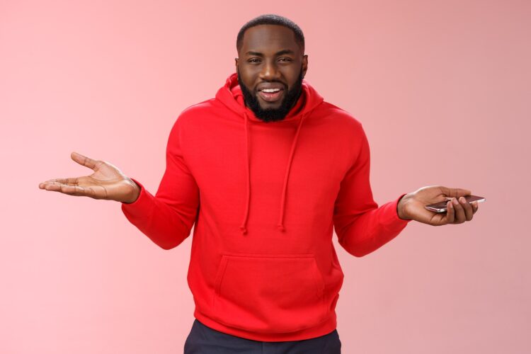 Who cares. Portrait indifferent unbothered chill good-looking african-american guy shrugging hands