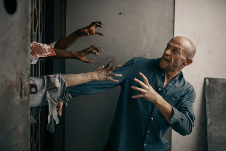 Man running away from zombie army, apocalypse