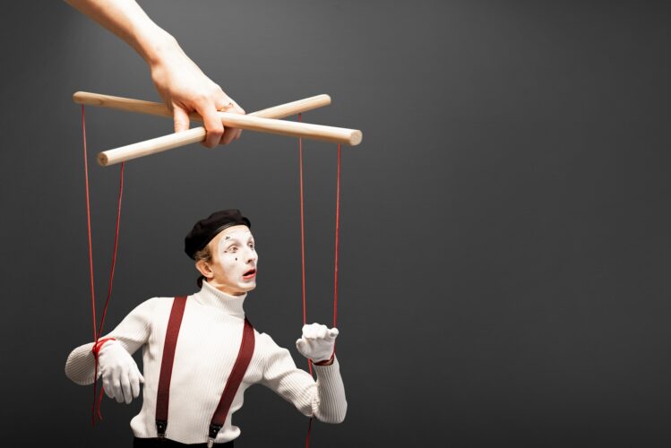 Marionette contolled by a hand