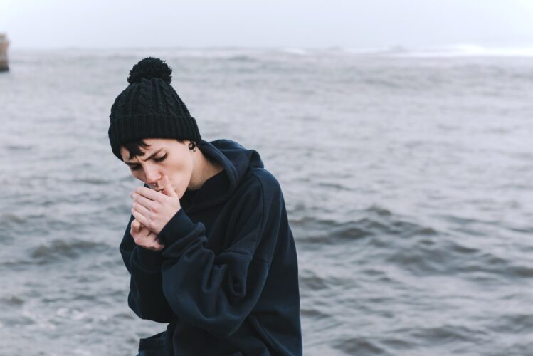 Girl smoking a cigarette.