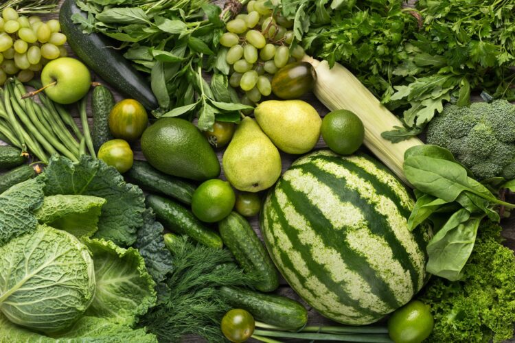 Green fruits and vegetables collection, creative background