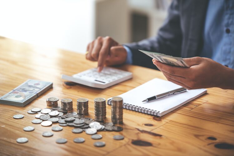money saving business On a table with sunlight. Money Saving Ideas for Financial Accounting