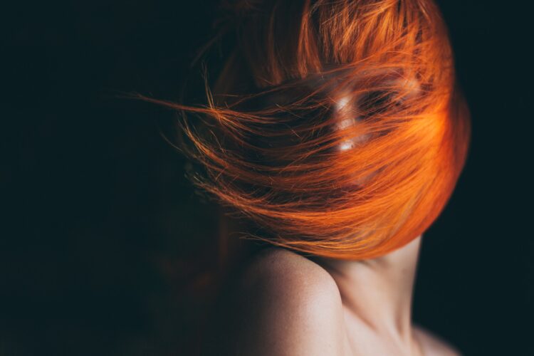 Portrait of young red hair girl