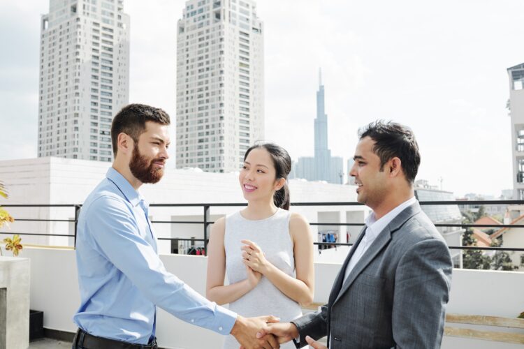 Project manager and investor shaking hands
