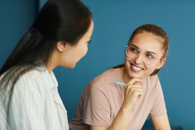 Student girls discussing project ideas