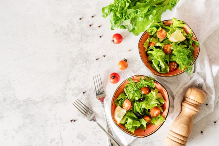 Fresh veggie salad in bowls