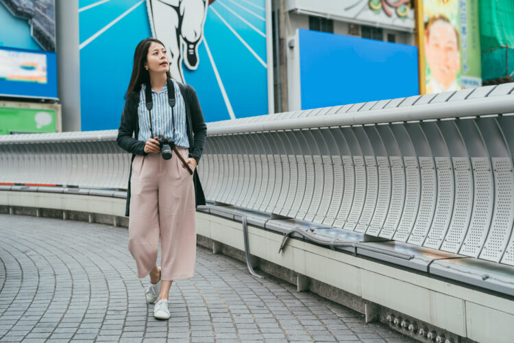 leisure woman walking in shinsaibashisuji
