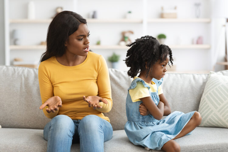 Parent Child Conflicts. Young Black Mother Scolding Offended Little Girl
