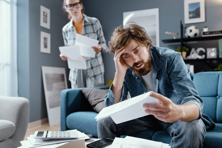 Young couple having budgeting problems