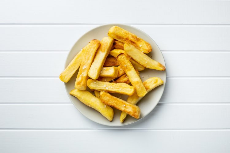 Big french fries. Fried potato chips.