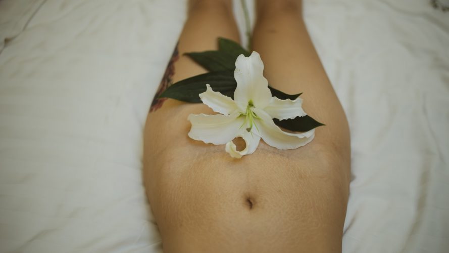 Woman Hiding Her Vagina From Flowers