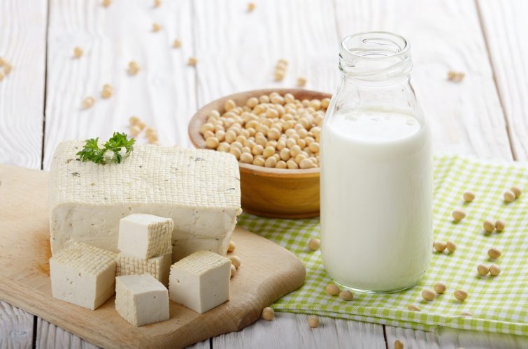 Non-dairy alternatives Soy milk or yogurt in glass bottle and to