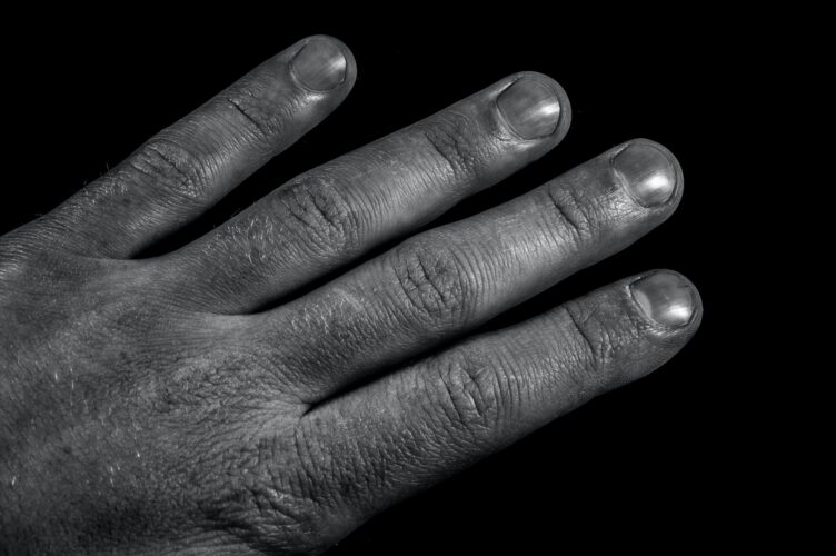 Fingers of a man’s hand