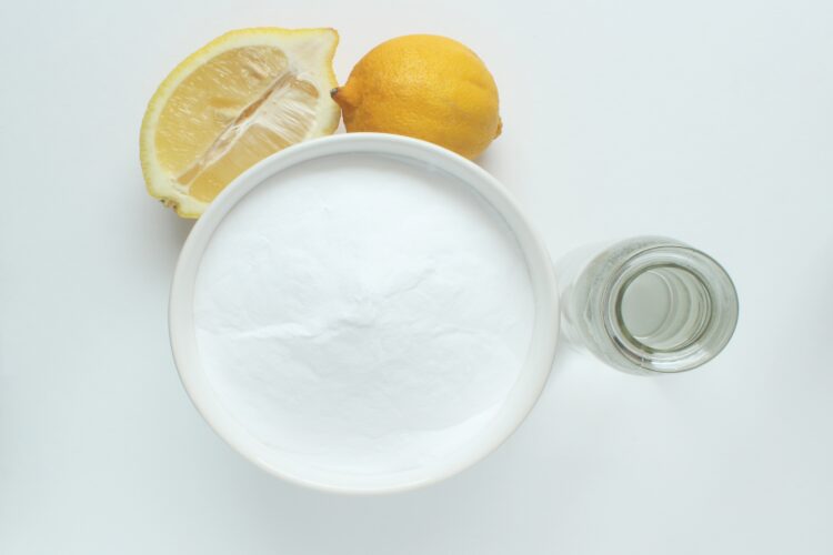 Natural cleaning supplies baking soda, lemon and vinegar