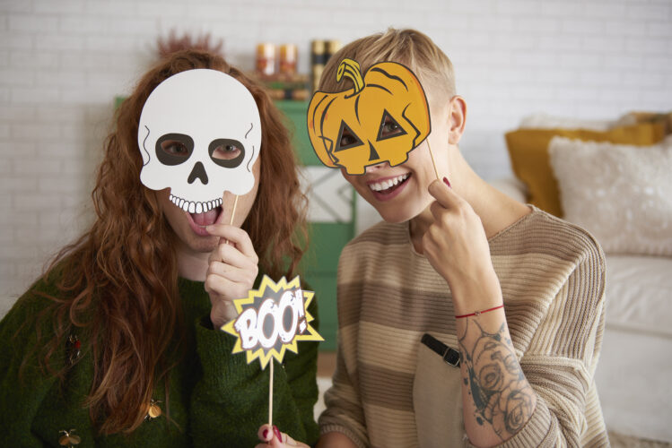 Girls with funny halloween masks